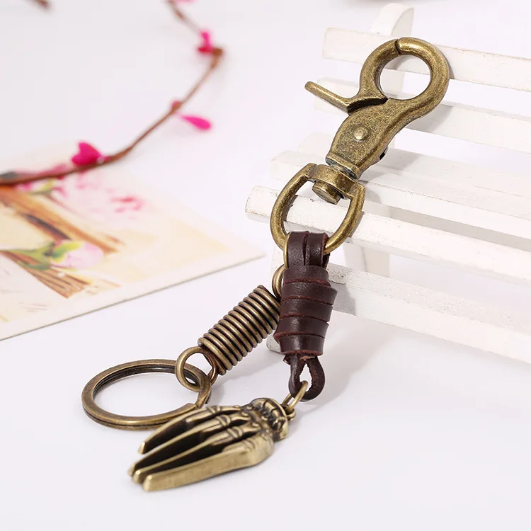 

Punk men's vintage cowhide keychain alloy bronze palm pendant schoolgirl backpack pendant