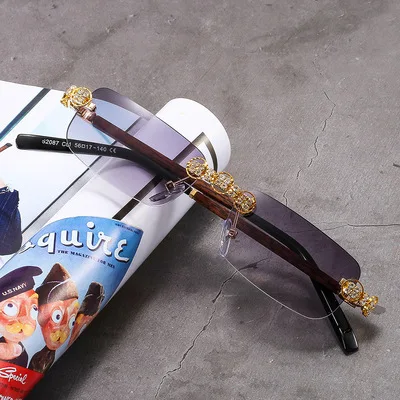 

New fashion retro small box personalized diamond sunglasses European and American frameless trimming personalized sunglasses