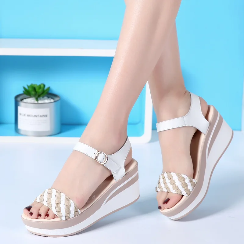 

Summer new Korean flat bottomed versatile women's sandals thick bottomed muffin women's shoes Woven slope heel sandals