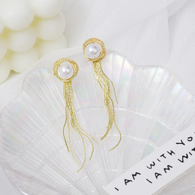 

Japan and South Korea's New Super Flash Pearl Earrings, A Two-wearing Long Tassel Earrings, Fashion Slim Ladies Earrings.