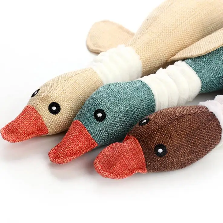 

Cute cat dog toy pet chewing toy cartoon biting linen wild goose snoring toy puppy dog toy free product