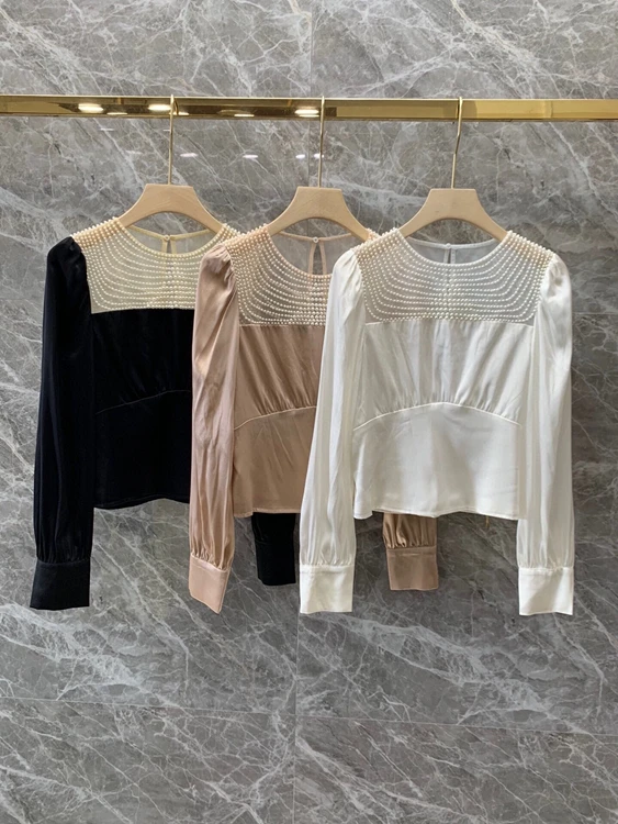 

2021 spring and summer new women's fashion round neck net yarn perspective splicing hand nailed Bead Long Sleeve Top 322