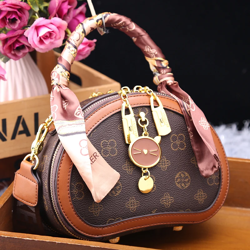 

Роскошная брендовая универсальная маленькая круглая сумка из 100% натуральной кожи в западном стиле для дальнозоркости Повседневная сумка-м...