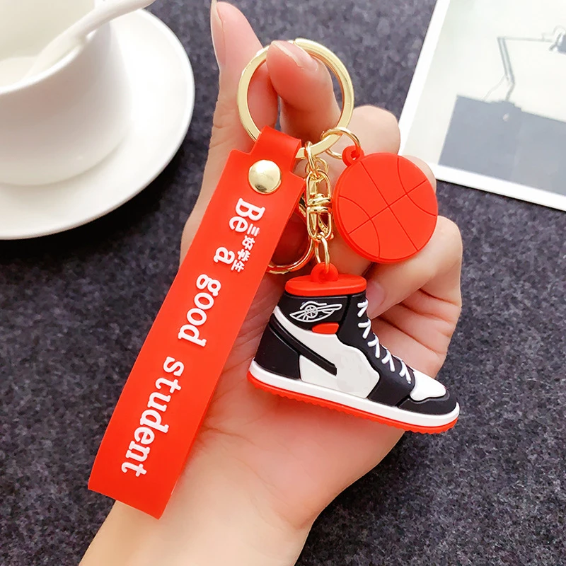 

3D image kawaii Keychains simulation Soccer shoes creative Keychains keyrings bag Pendant anime figure hiker shoes baby toy cute