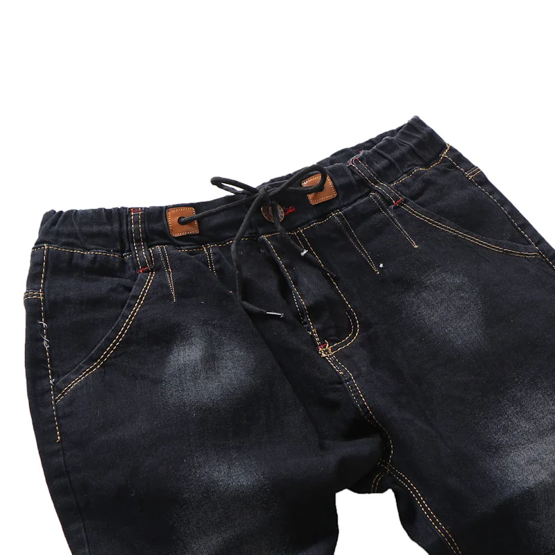 

2020 Men's Jeans New Hole Slim Trousers Denim Elastic Skinny Cotton Male Pleated and Perforated Cordage Elastic Slim Fit Jeans