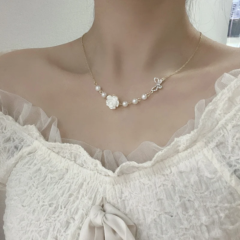 

Retro super fairy rose flower necklace female 2021 new ins wind butterfly pearl clavicle chain necklace Wholesale