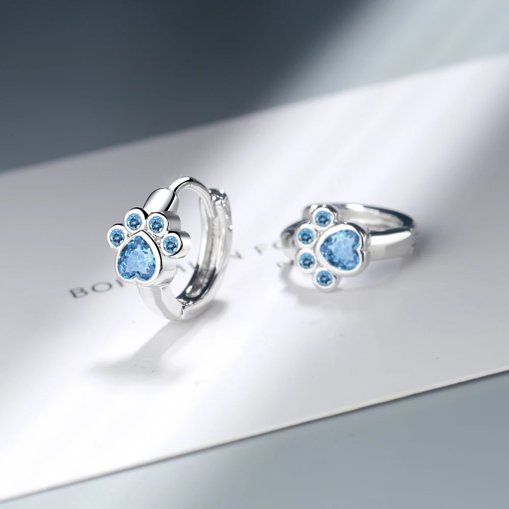 

Серьги-кольца женские из серебра 925 пробы с голубыми кристаллами