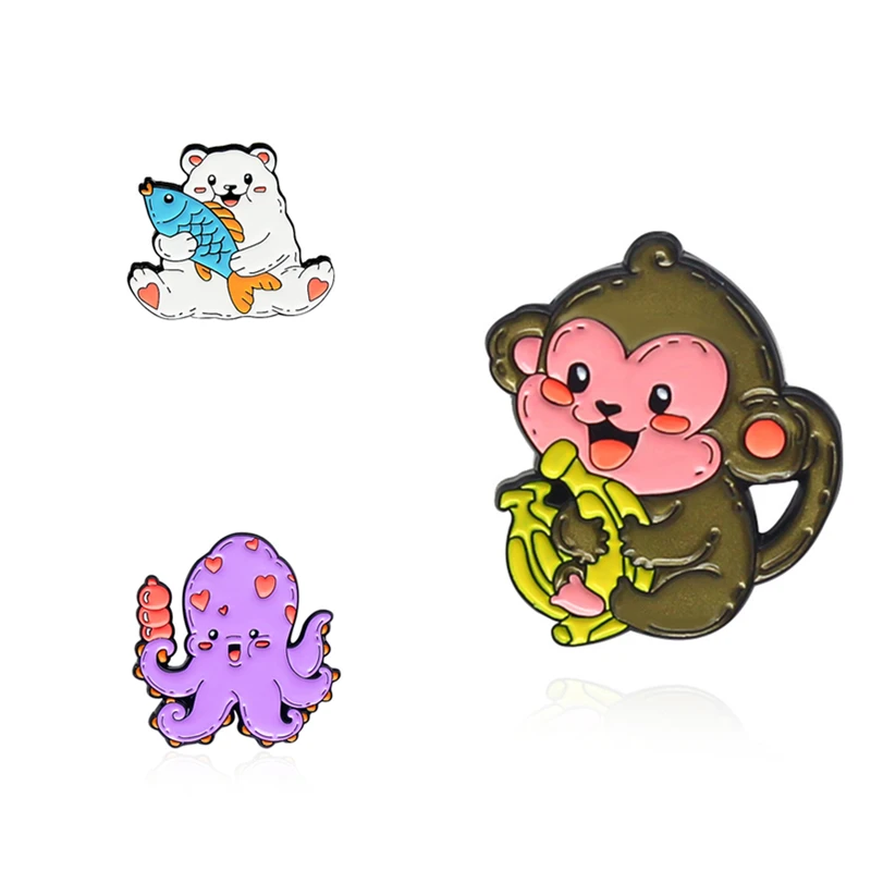

2021 Fashion New Cute Polar Bear Holding Fish Brooch Cartoon Monkey Holding Banana Brooch Octopus Monkey Polar Bear Brooch.
