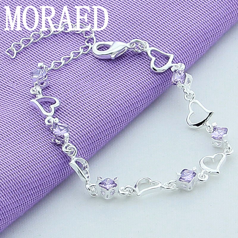 

Женский браслет из серебра 925 пробы с фиолетовым цирконием