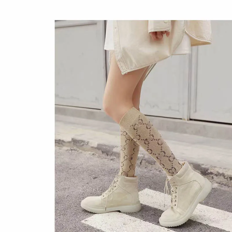 

INS trendy socks gold silk silver piled pile socks GG letter socks cotton socks medium tube light pink bright silk ladies socks