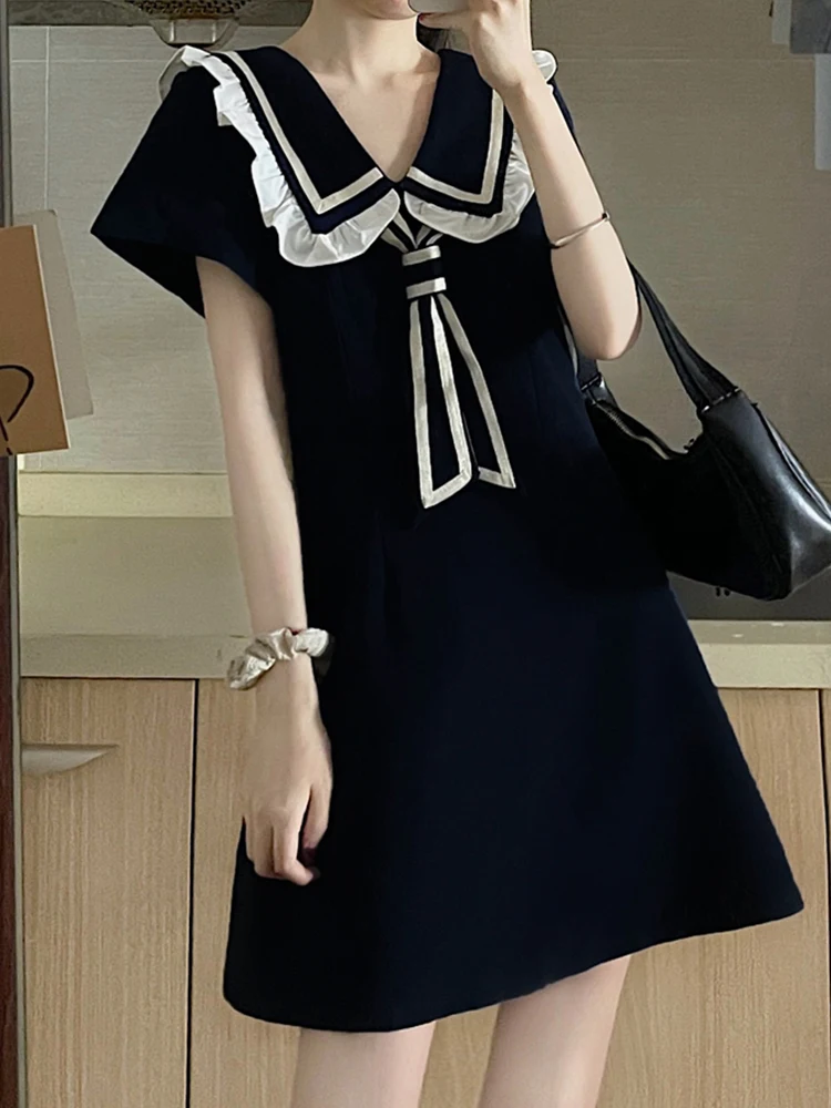 

2021 Summer Preppy Style Splicing Peter Pan Collar Little Black Dress was A Word Skirt Cultivate one's Morality Short Slee Belt