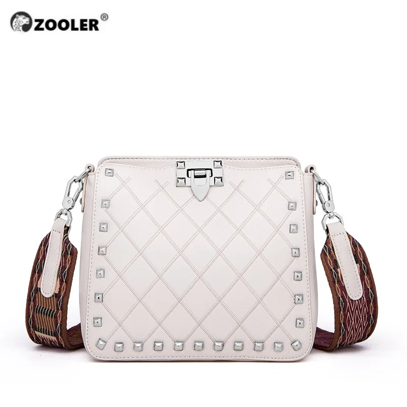 Женские вечерние сумки в заклепках ZOOLER роскошные из натуральной воловьей кожи с