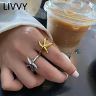 Кольца женские регулируемые в виде морской звезды, серебристый цвет открыт