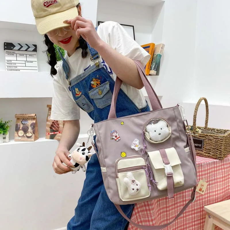 Large-capacity student class bag 2021 new Japanese ins cute soft girl shoulder bag campus cartoon messenger bag.