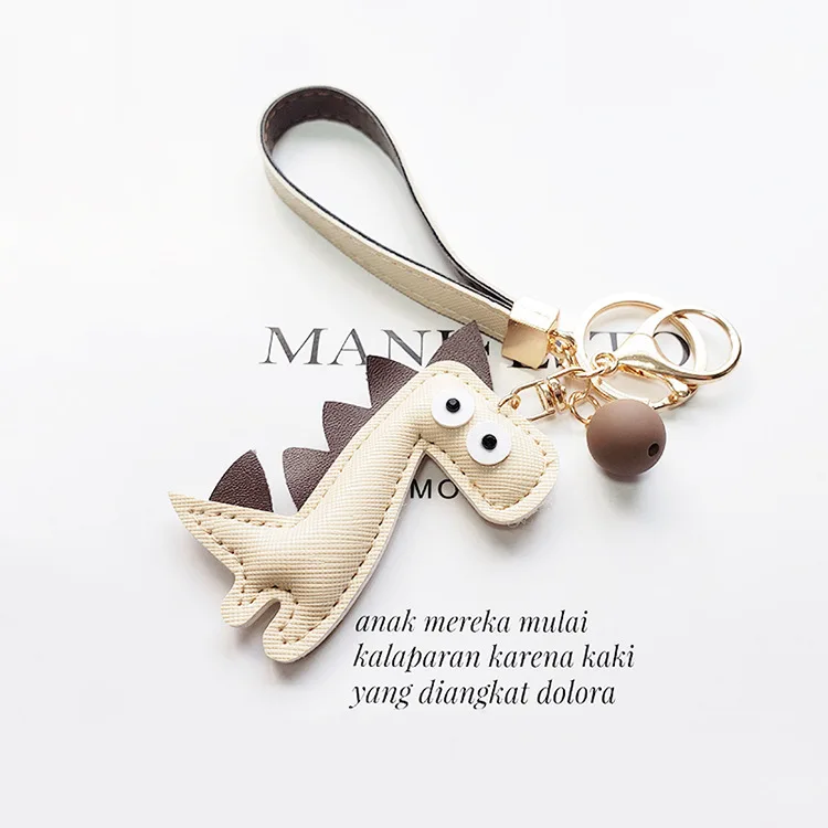 

2020 New Cute Little Dinosaur Car Keychain Pendant Creative Gift Leather Key Chain Car Pendant Decoration Women Keyring Pu