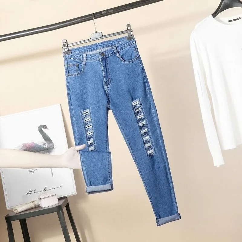 Women's Jeans 2020 Ripped Female Jeans Korean Button Hole Ms. Denim High Waist Loose Casual Pencil Pants