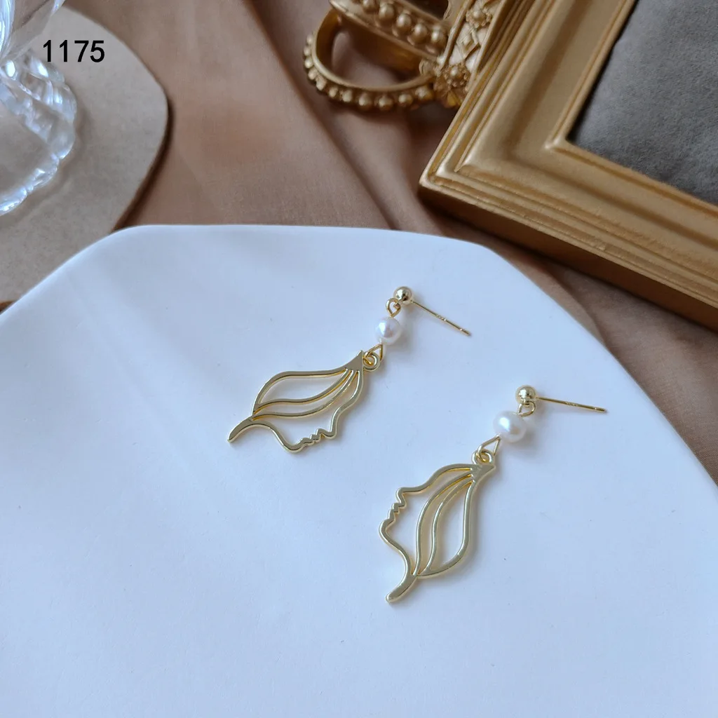 Женские серьги-гвоздики ручной работы с натуральным пресноводным жемчугом 14