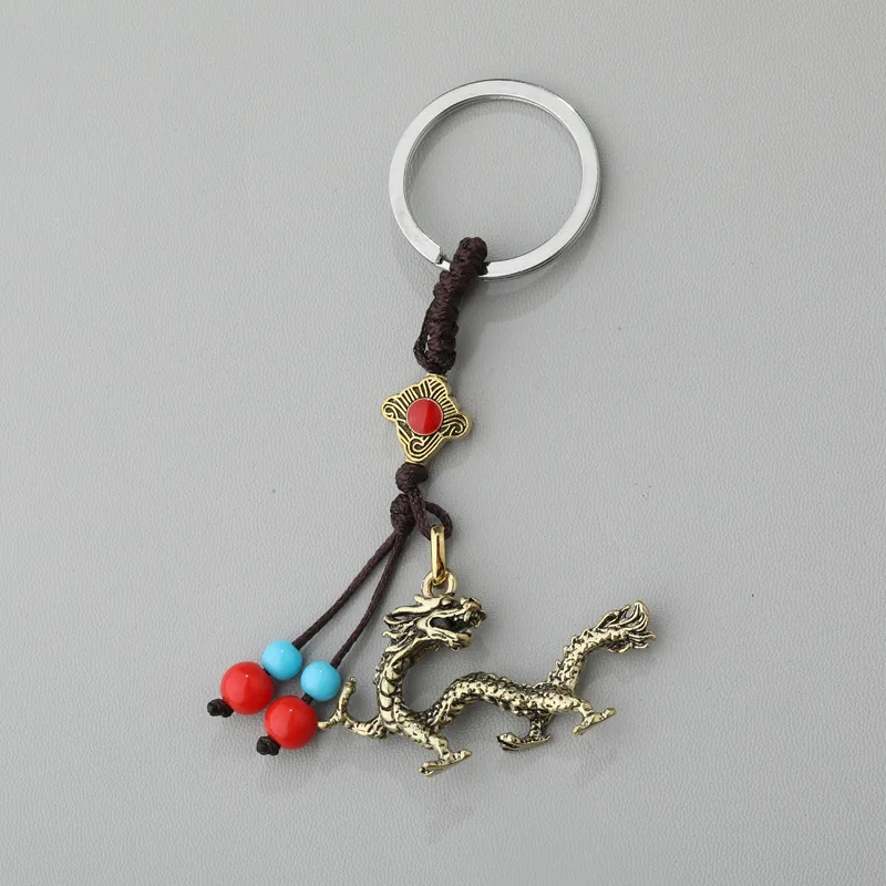 Металлический брелок в виде животных