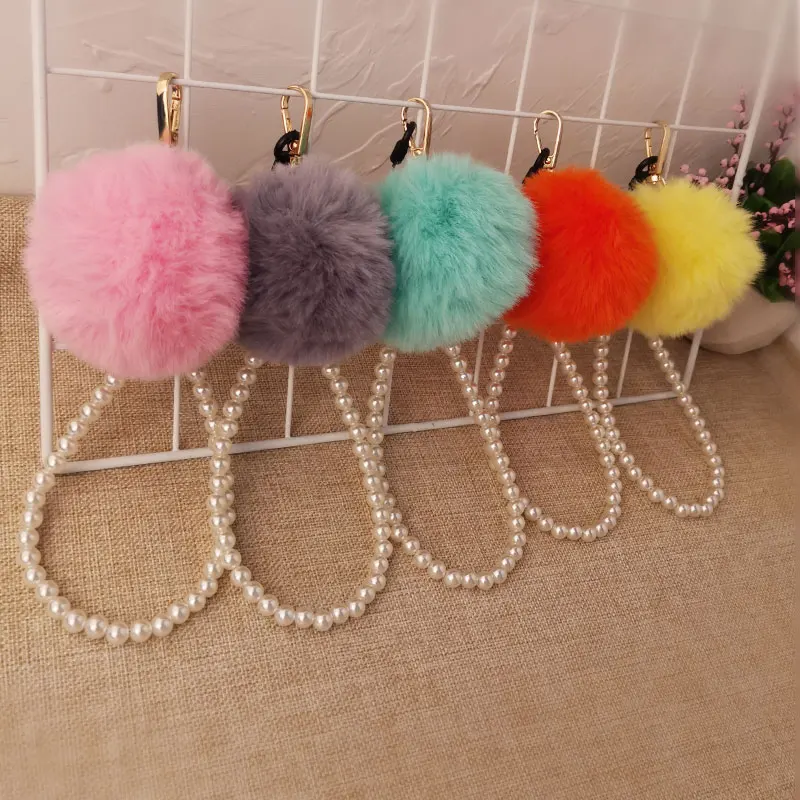 

Suitable for iphone 13 Huawei Samsung Xiaomi camera hair ball lanyard bracelet type lanyard keychain fashion high-end type