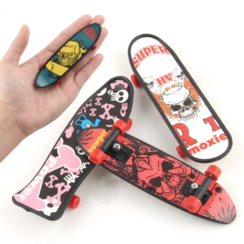

10cm Mini Skate Finger Skate boarding Fingerboard Novelty Desktop Toys Skateboard Finger Board Gifts for Boy Children Cool Stuff