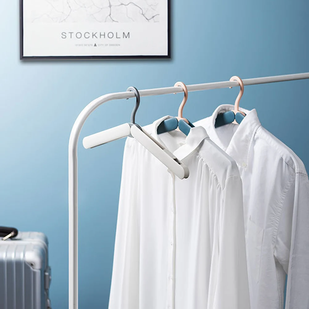 

Travel clothes hanger Portable Folding Clothes Hanger Multifunction Magic Stretch Drying Rack Home Wardrobe Storage Rack