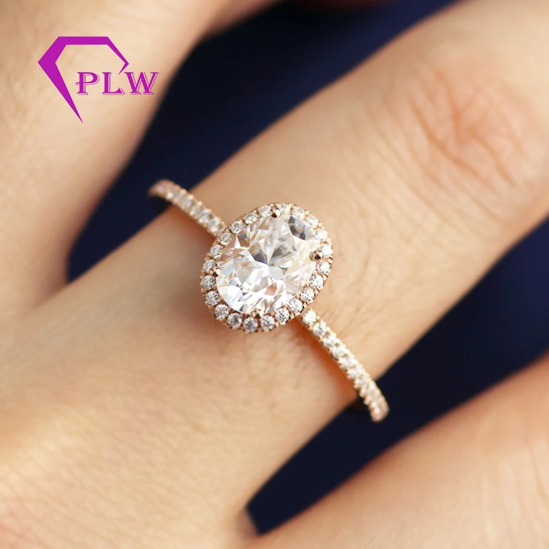 Кольцо обручальное с муассанитом овальной огранкой из розового золота 18 К 5x7 мм