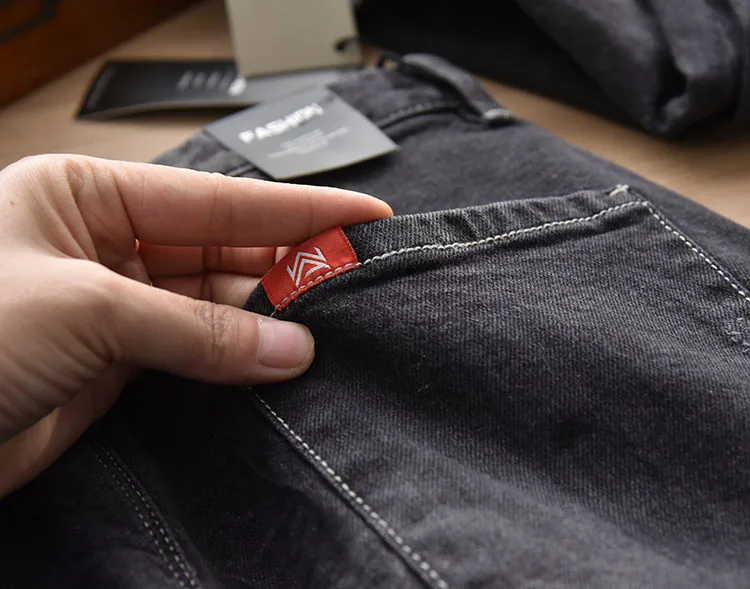 Autumn and winter washed scratch legged jeans men's pants comfortable and versatile retro closure casual pants