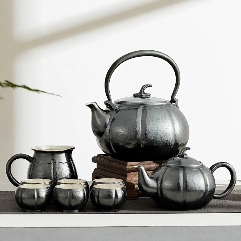 

Silver pot sterling silver 999 tea set kettle silver teapot anti-scalding household silver cup pumpkin 9 piece set about 1468g