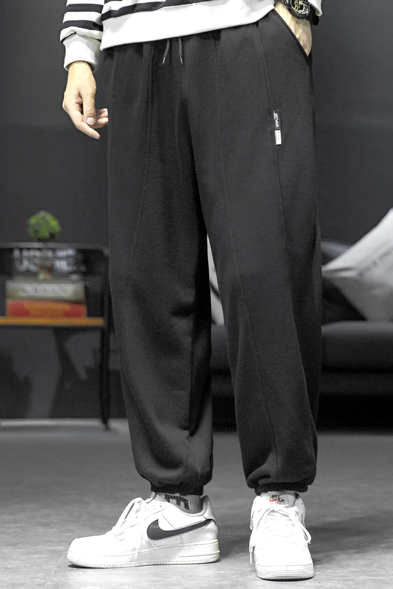 

Casual pants men's sports trousers loose cotton line stitching pants simple fashion solid trend male pants spring and autumn