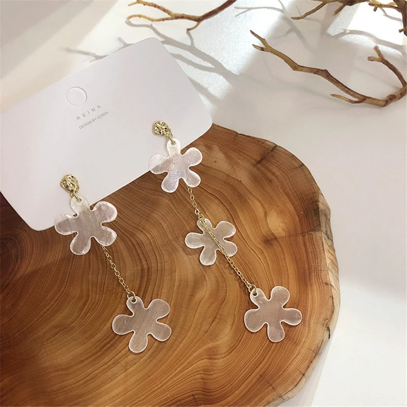 Женские асимметричные серьги подвески длинные в виде ракушек цветов и кисточек