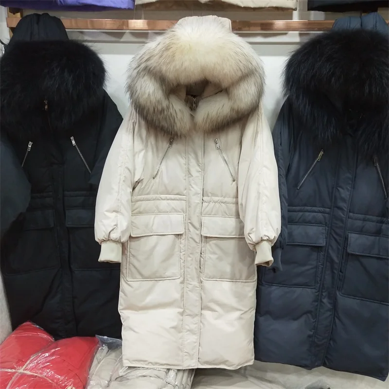 Женское пальто на утином пуху с большим капюшоном из меха енота женская зимняя