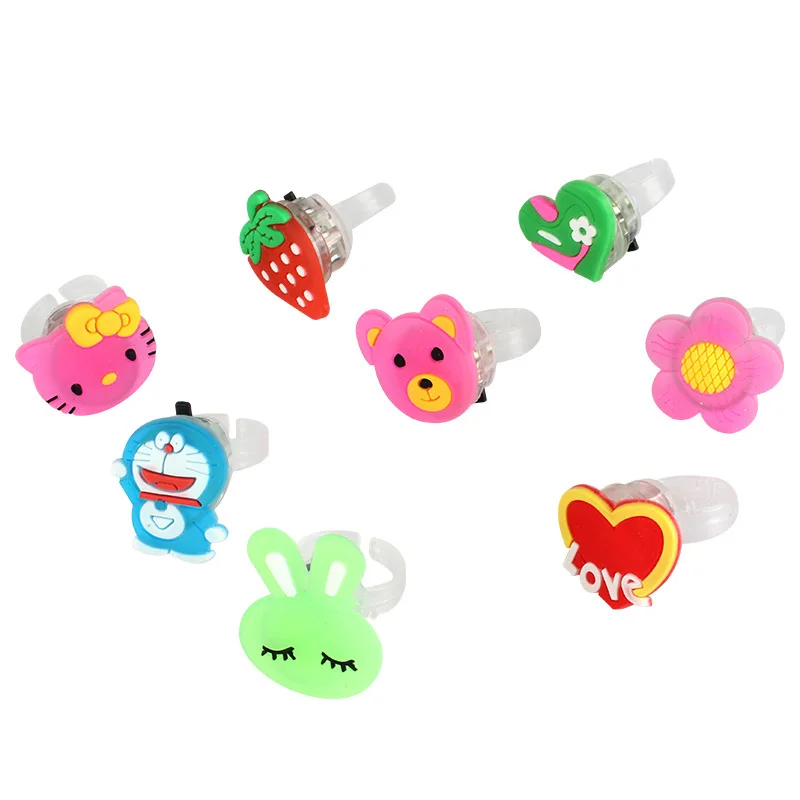 

12pcs Luminous rings new kid's toys flash gifts LED cartoon lights glow in the dark toys for childs playing in night Action Toy