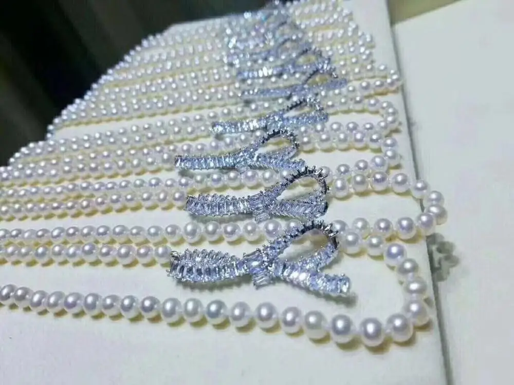 

elegant 9-10mm round white pearl necklace 18inch