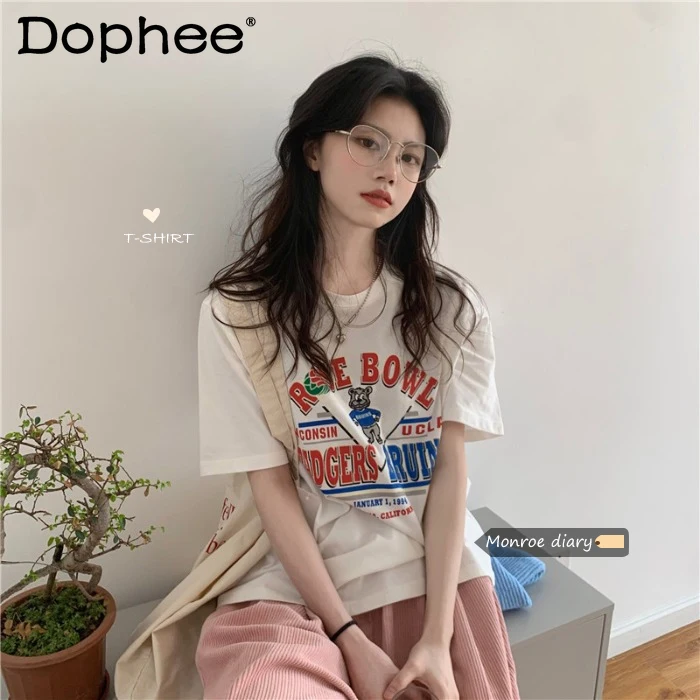 

Свободная белая футболка с коротким рукавом и мультяшным принтом для женщин, новинка 2021, летний топ с рукавом до локтя, модная Универсальная...