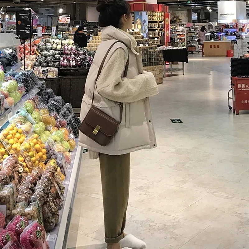 Жилет женский однотонный с хлопковой подкладкой однобортный свободный пуховик