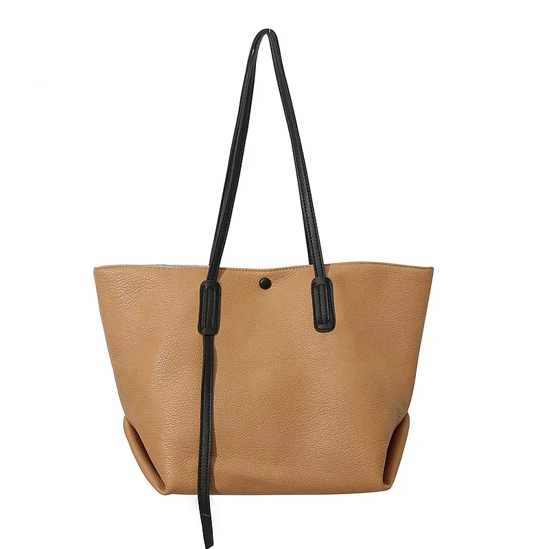 

2021 New Korean fashion pure color bump ins versatile casual temperament large capacity son mother tote bag female bag