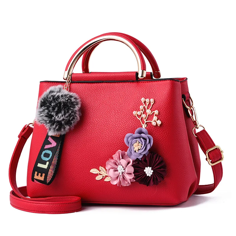 

2021 new solid color fashion three-dimensional embroidered flower iron handle portable Pu women's bag Korean Trend