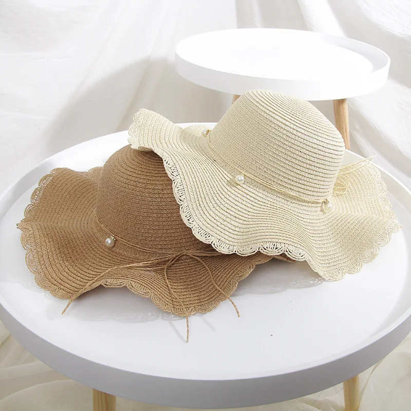 

Straw hat female summer wave along pearl bow knot big brim hat Korean travel beach sunscreen hat