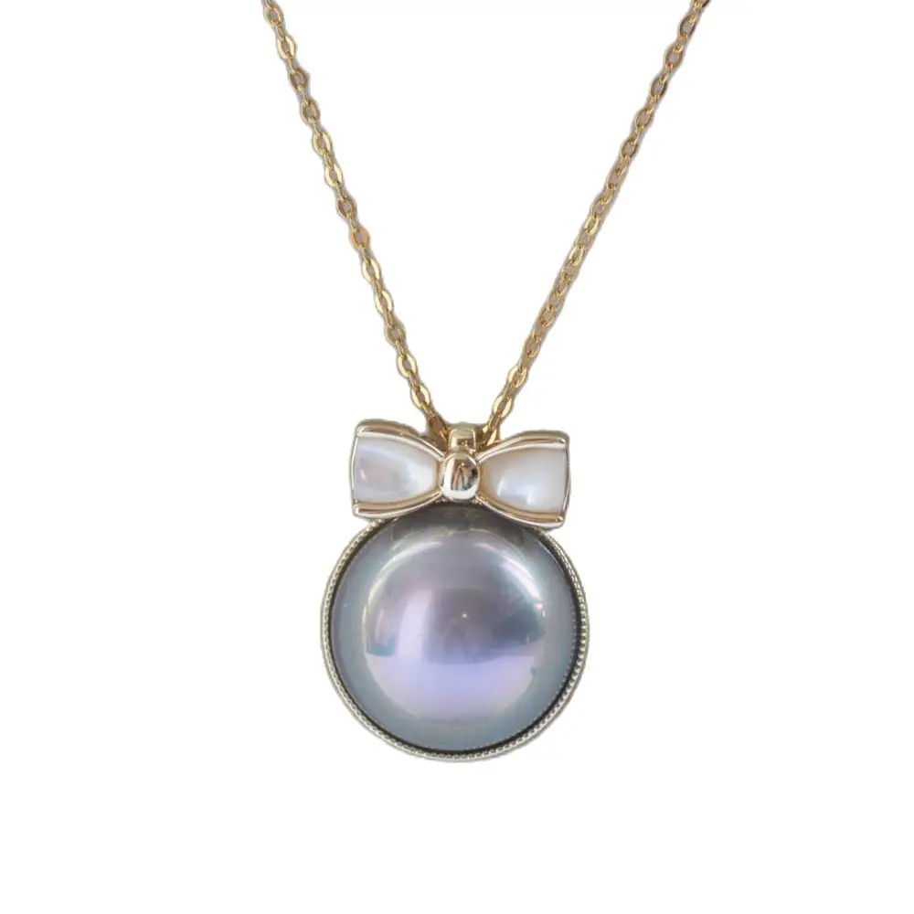 

MCT·STAR Z11110 Lustre 16mm Blue Shell Mabe Pearl Bowknot Chain Pendant CZ