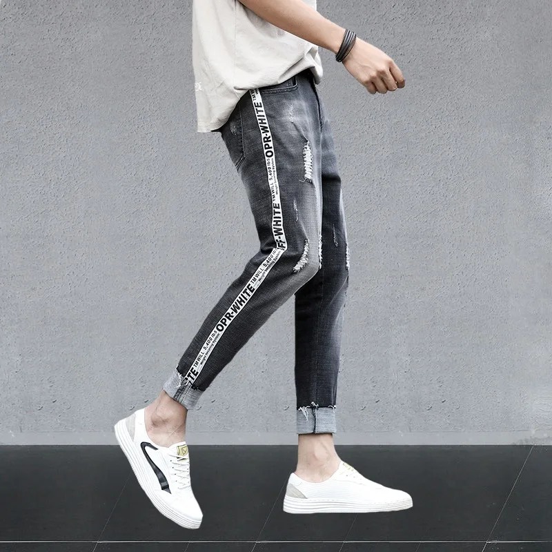 

Summer thin 2021 Fashion all-match ripped grey jeans men's Korean teenagers small feet beggar pants men's striped pencil jeans