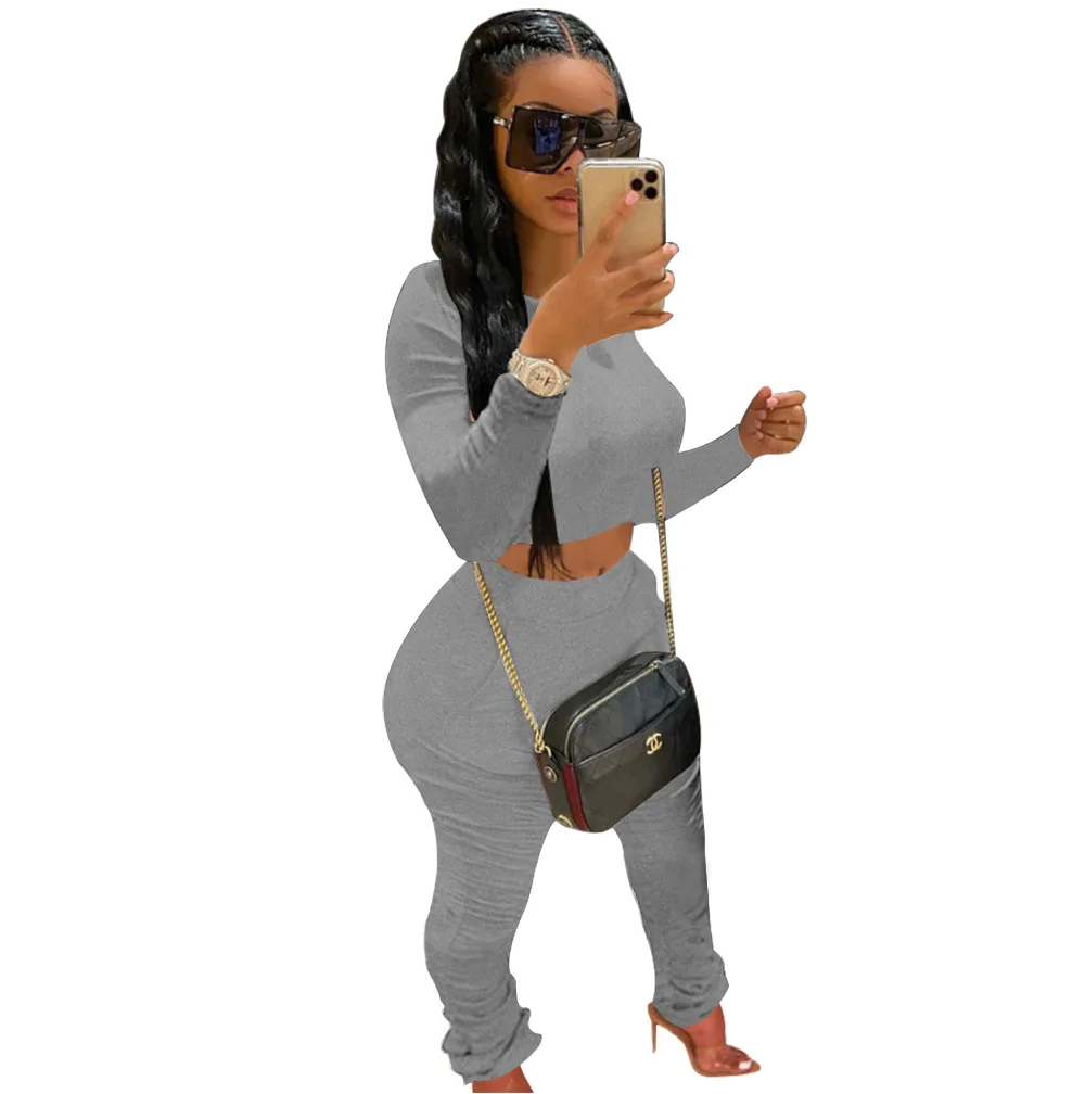 

New fashion solid color slim casual two piece set sexy o-neck long sleeve T-shirt and trousers women's suit