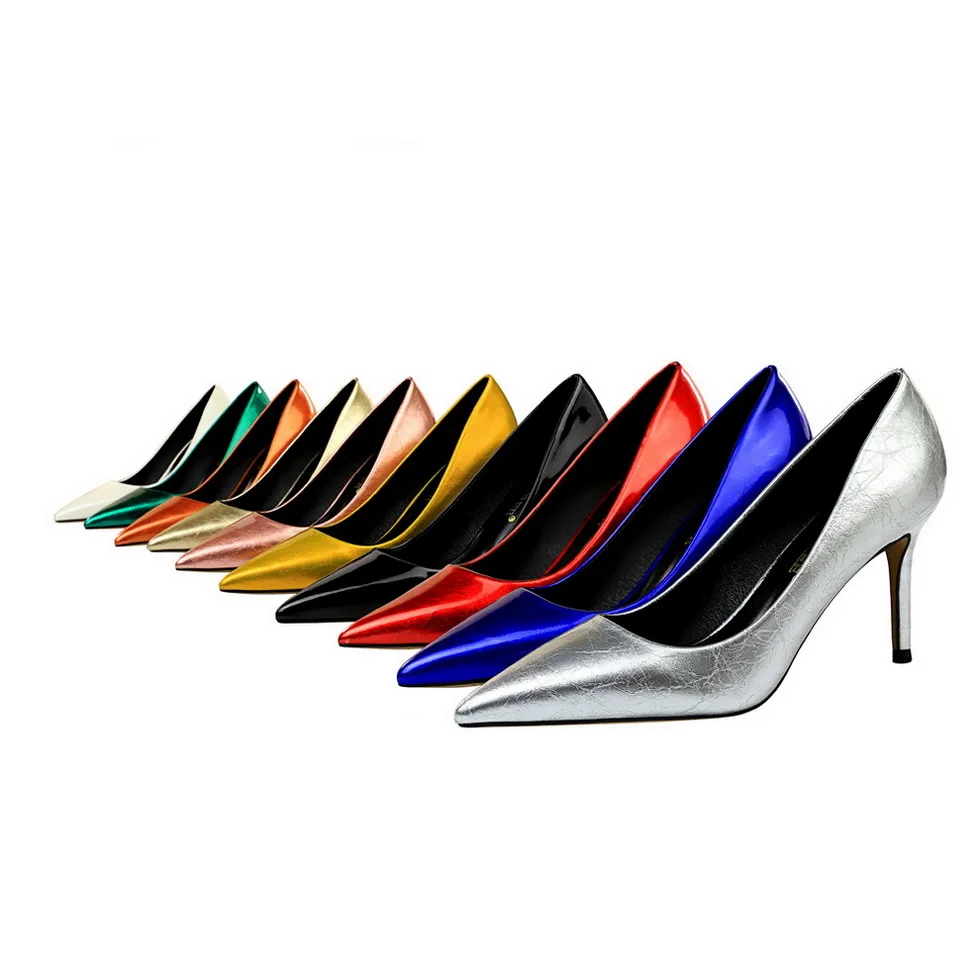 

European and American fashion simple large size thin heel retro high heels shallow mouth pointed sexy thin single shoes 272-1