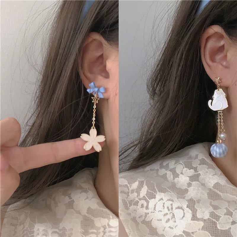 

Fashion Cat Asymmetric Earrings Gold Stars White Cat Earrings Female Popular Cat Flower Pendant Stud Earrings for Women