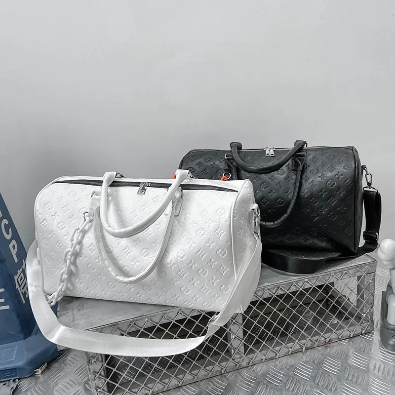 

2021 Travel Duffels handbag Women and Men Large Leather Luxury handbag Embossed Fashion gym travel Tote Bag Weekend Duffle Femal