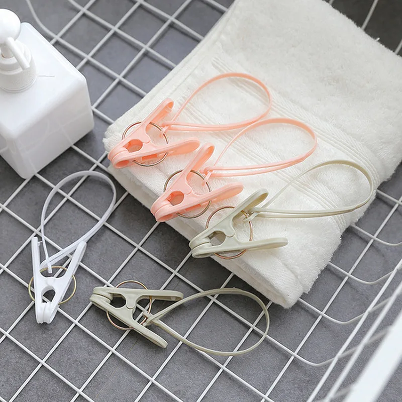 

12 шт., портативные вешалки для одежды