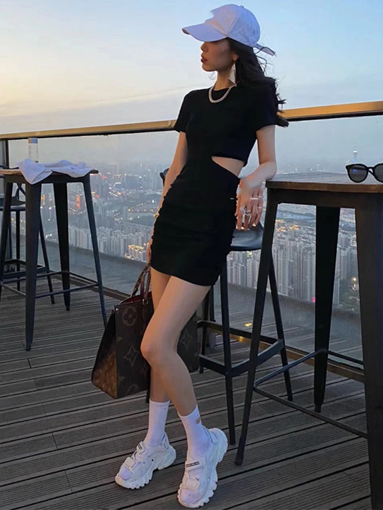 

Side leakage waist dress women's summer waist tight and careful machine show thin black cotton temperament sexy pleated hip skir