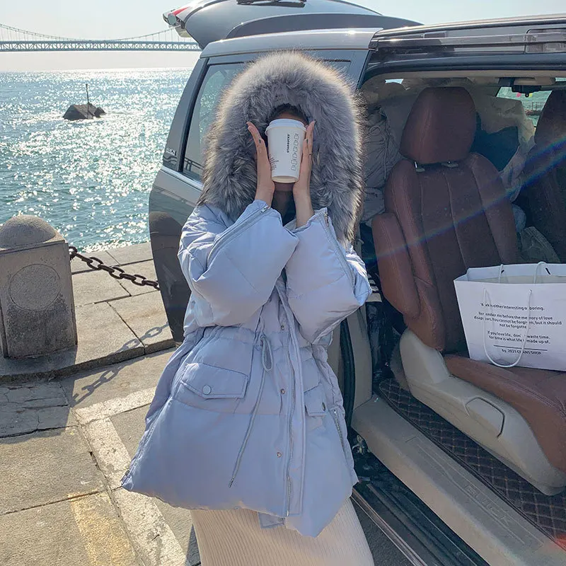 

Autumn and winter new cotton-padded jacket, light blue waist, Korean style hooded big fur collar mid-length cotton-padded jacket
