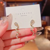 s925 silver needle korean version of the new design sense of personality twisted silk micro inlaid super flash earring for women