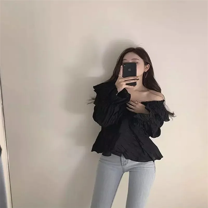 

RUGOD 2021 spring new v-neck ruffle stitching irregular pleated flared sleeve shirt