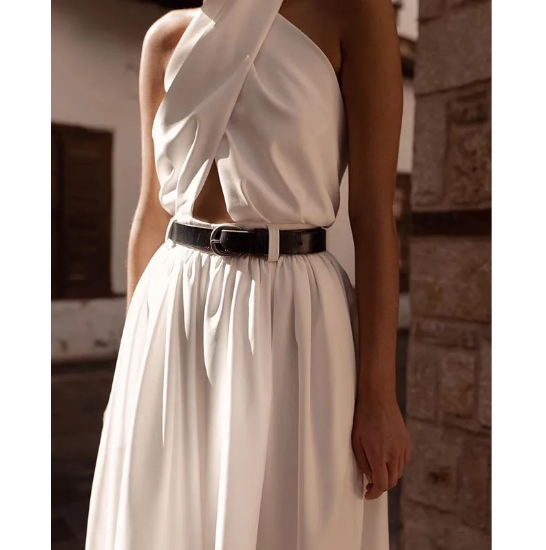 

YICIYA 2020 New Women Jumpsuits Sexy Backless Hollow Out White Rompers Female Solid Wide Leg Loose Ruffled White Jumpsuits Women